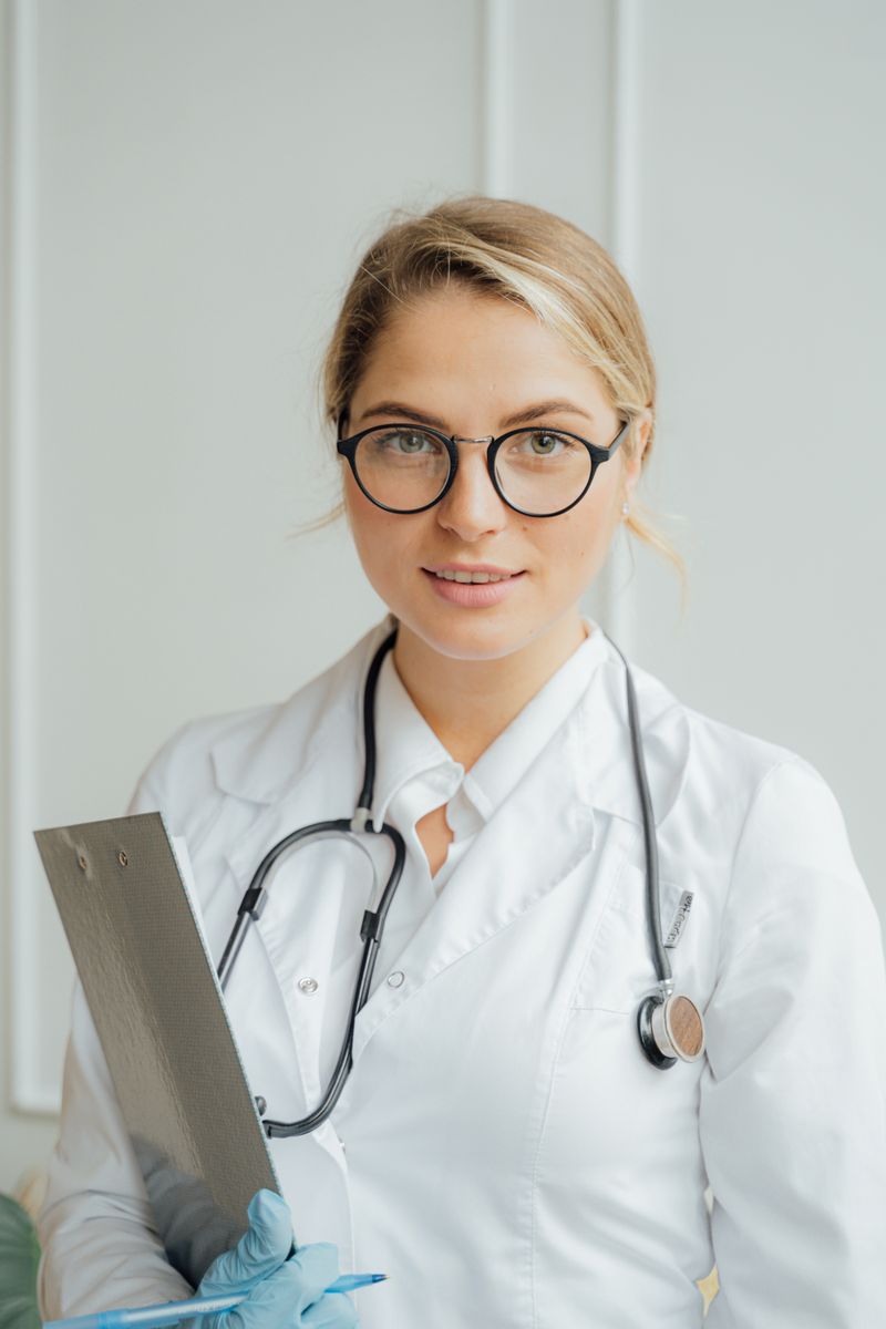 MindCare physician holding a patient chart