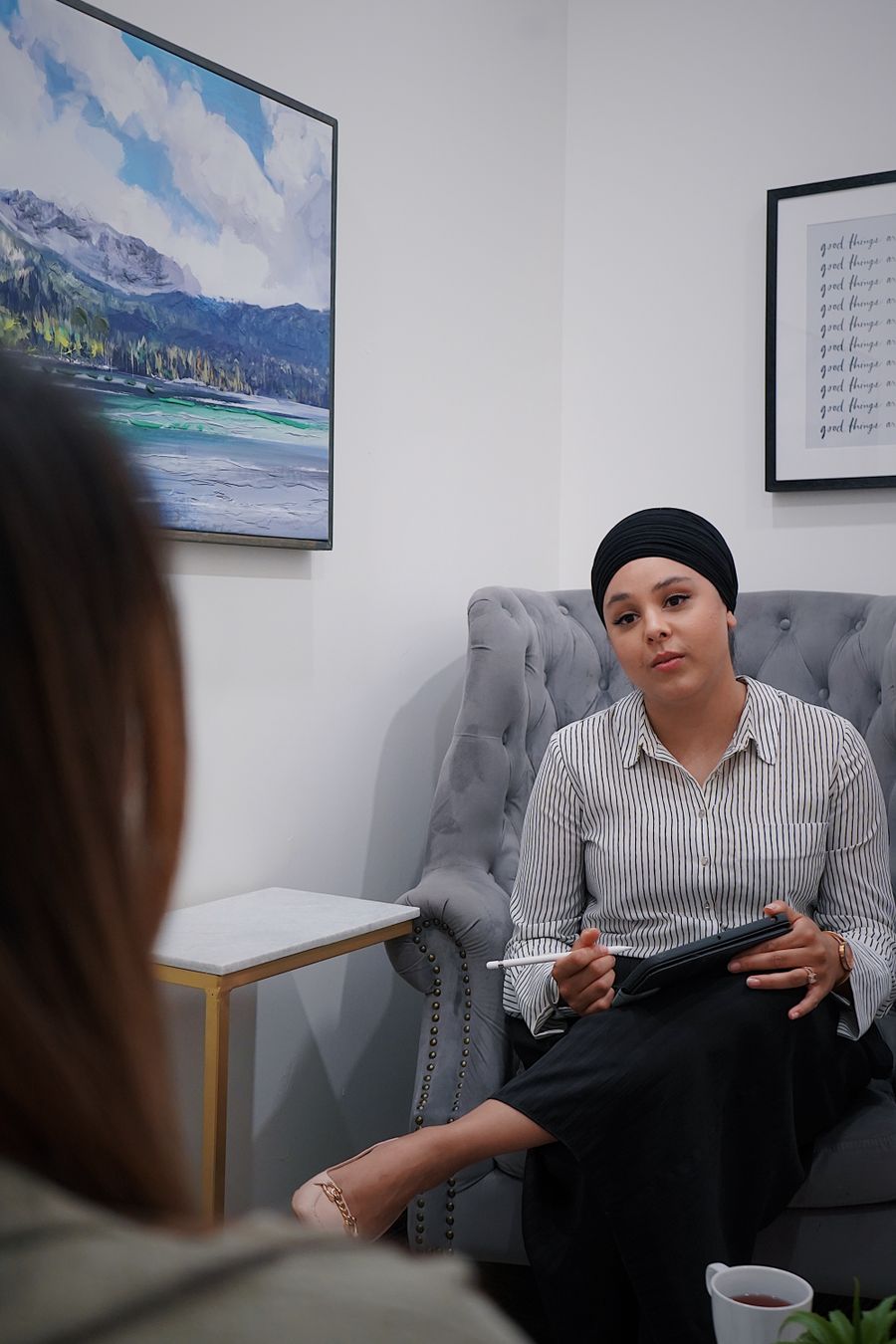 Therapist listening to a patient during a counseling session
